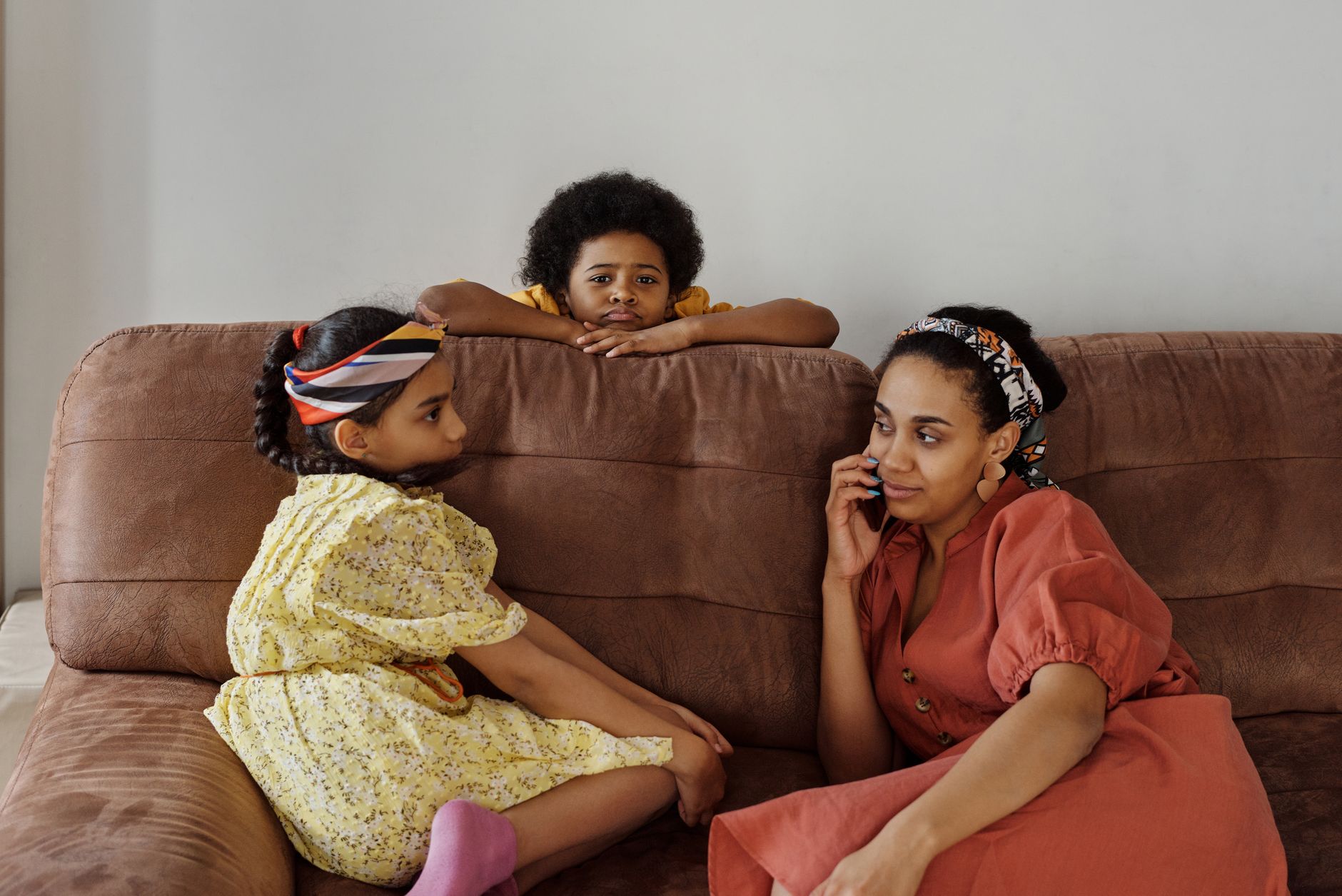 A family sitting together at home